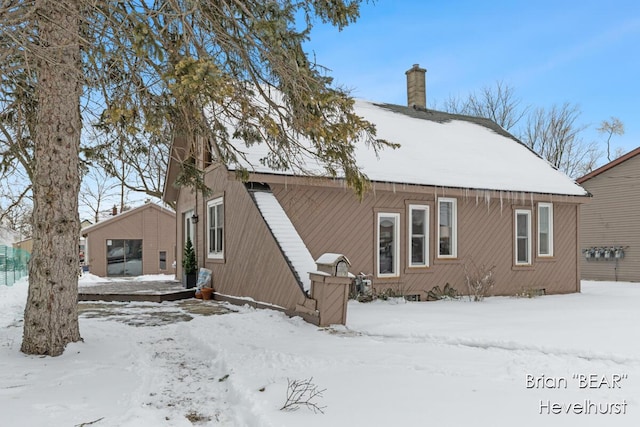 view of snow covered property