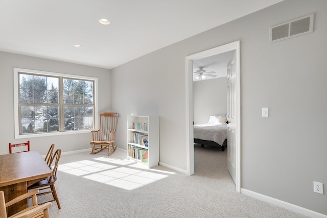 interior space featuring light carpet