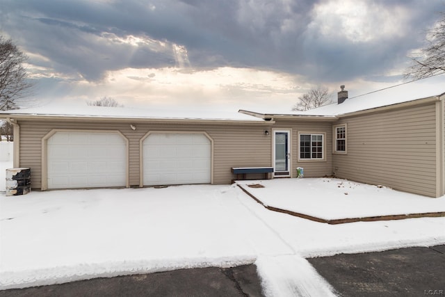 exterior space featuring a garage