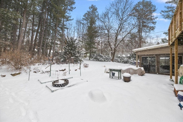 view of yard covered in snow