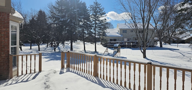 view of snow covered deck