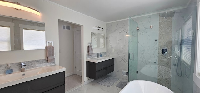 bathroom with plus walk in shower, crown molding, and vanity