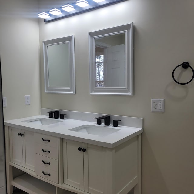 10781 Woodbrook Dr, Cement City, MI 49233 - bathroom with double vanity
