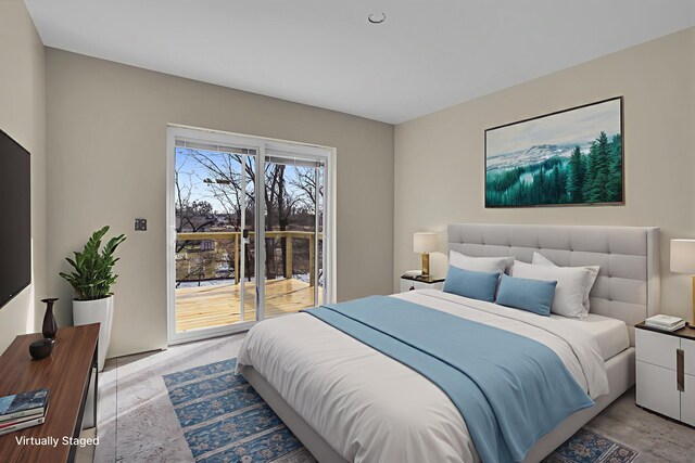 10781 Woodbrook Dr, Cement City, MI 49233 - bedroom featuring access to outside and light wood-type flooring