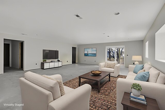 10781 Woodbrook Dr, Cement City, MI 49233 - living area featuring concrete floors