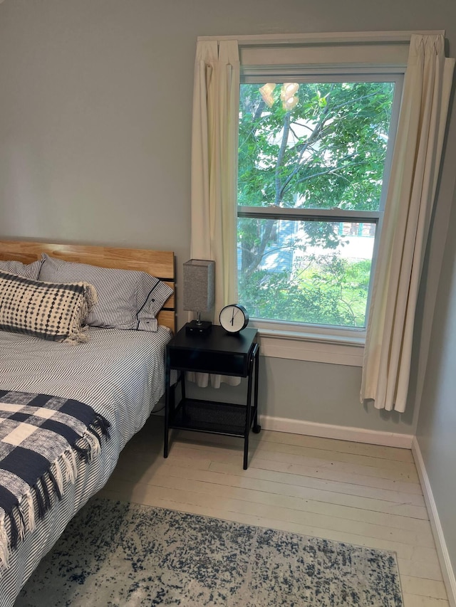 bedroom featuring hardwood / wood-style floors