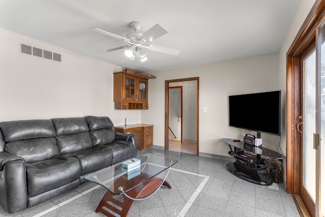 living room featuring ceiling fan