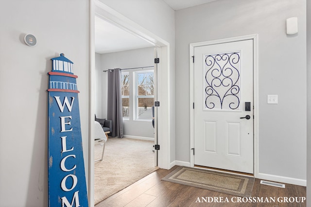 entrance foyer featuring dark wood-type flooring