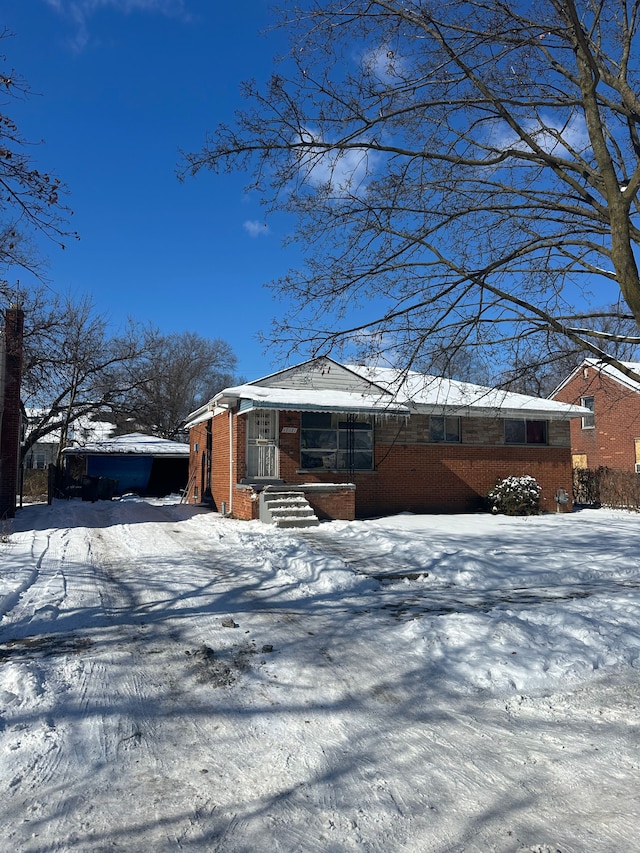 view of snow covered property