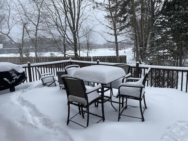 view of snow covered deck