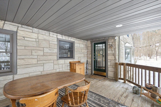 view of snow covered deck