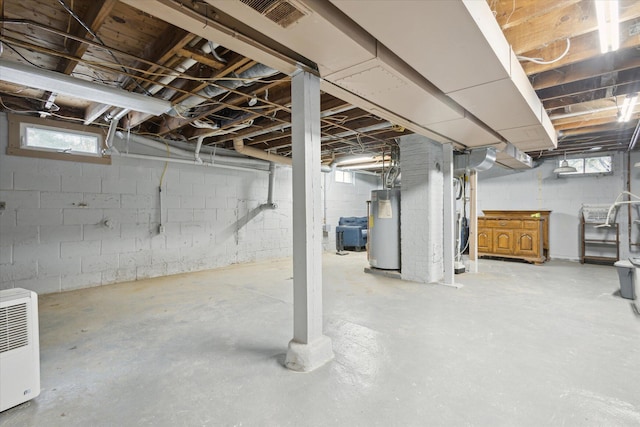 basement featuring water heater