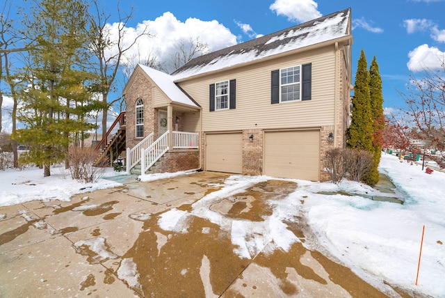 view of front of home with a garage