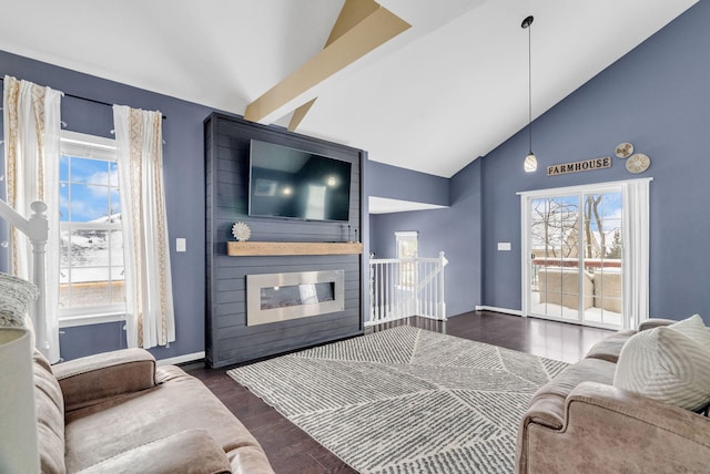 living room with high vaulted ceiling, dark hardwood / wood-style flooring, beam ceiling, and a fireplace