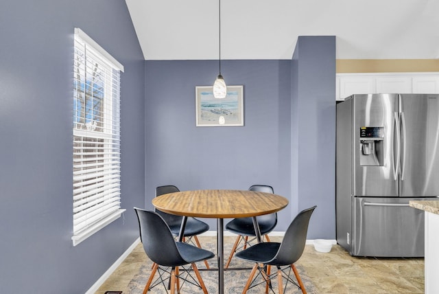 dining space featuring a healthy amount of sunlight