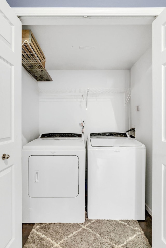 washroom featuring independent washer and dryer