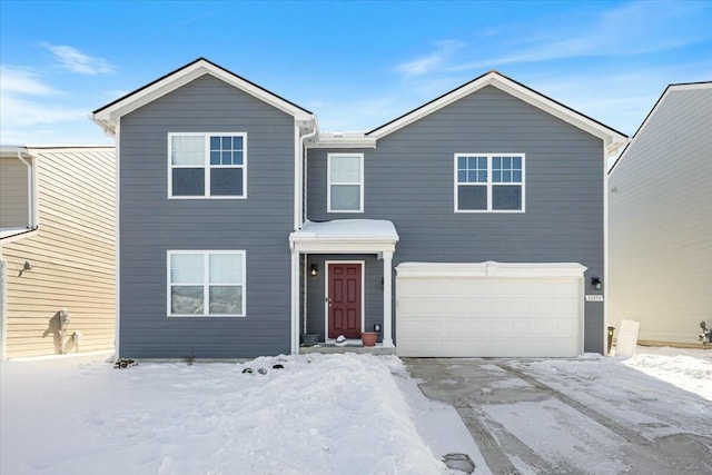 view of front of property featuring a garage