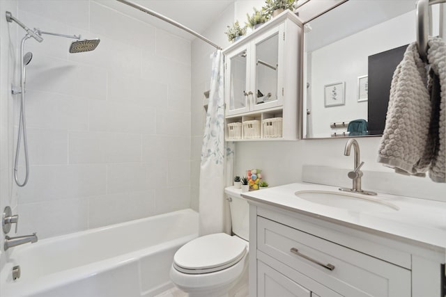 full bathroom featuring toilet, shower / bath combination with curtain, and vanity