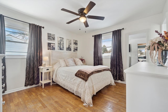 bedroom featuring ceiling fan and light hardwood / wood-style floors