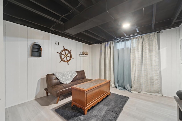 sitting room featuring wood-type flooring