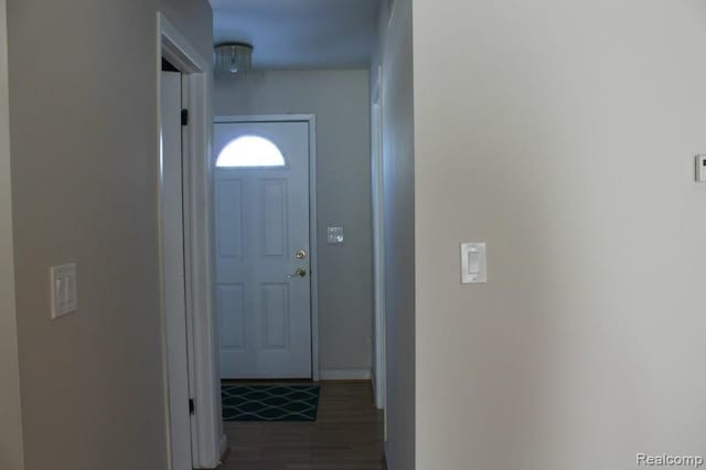 doorway featuring dark hardwood / wood-style flooring