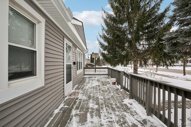 view of snow covered deck