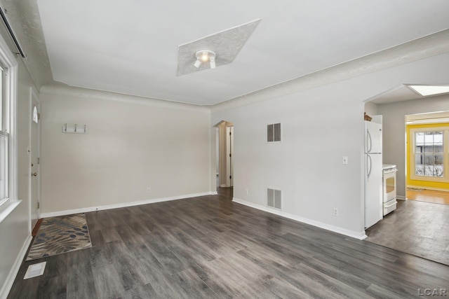 unfurnished room featuring dark hardwood / wood-style floors