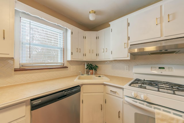 kitchen featuring sink, white cabinetry, dishwasher, white gas range, and tasteful backsplash