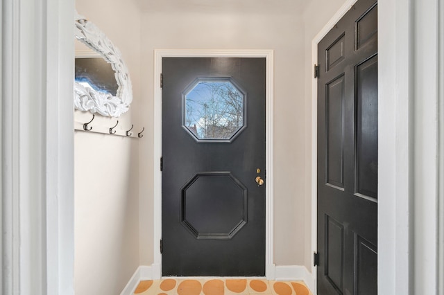 doorway with baseboards