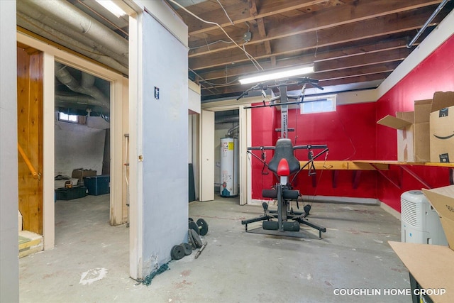 workout area featuring gas water heater