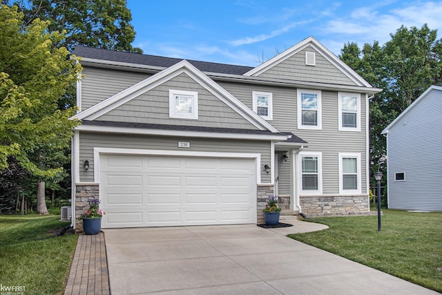 view of front facade featuring a garage, stone siding, concrete driveway, and a front yard