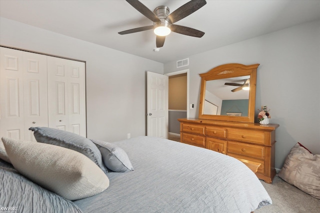 bedroom featuring carpet, a closet, visible vents, and ceiling fan