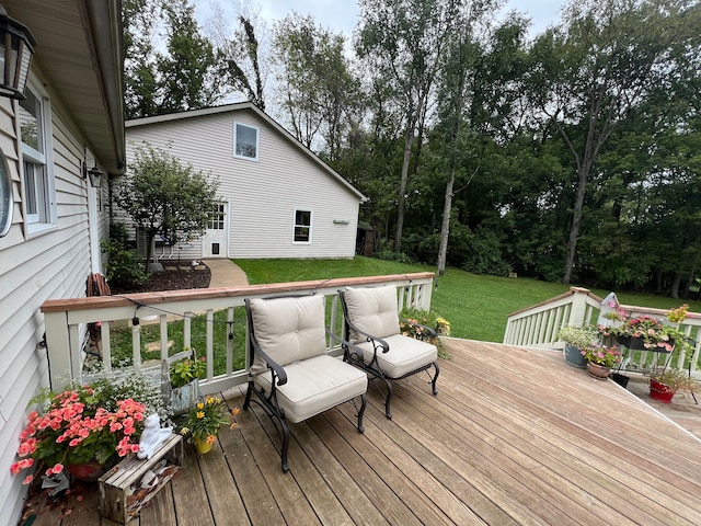 wooden deck with a yard