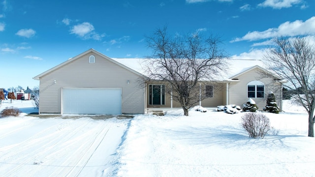 single story home with a garage