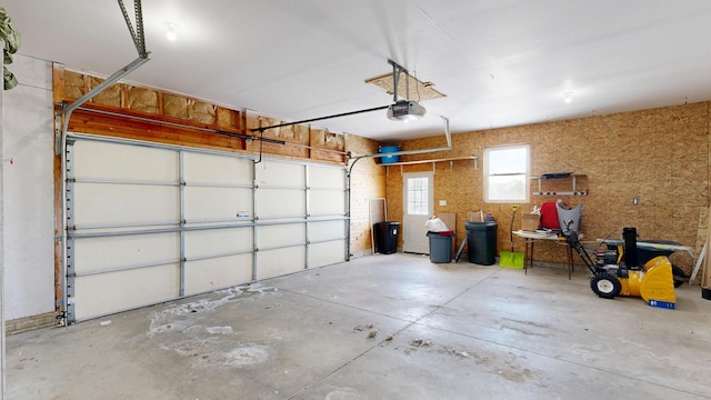 garage featuring a garage door opener