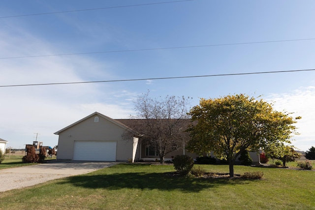 view of front facade featuring concrete driveway, a front lawn, and an attached garage