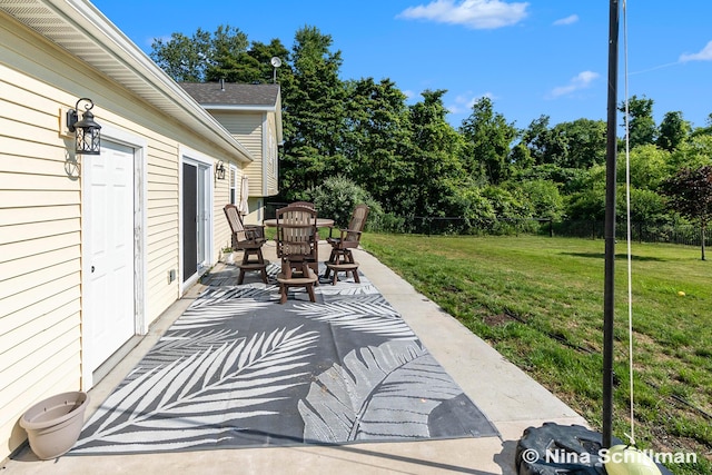 834 N Michigan St, Fremont, MI 49412 - view of patio featuring view of wooded area