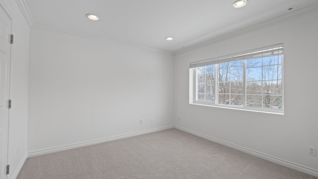 interior space featuring carpet floors, ornamental molding, recessed lighting, and baseboards