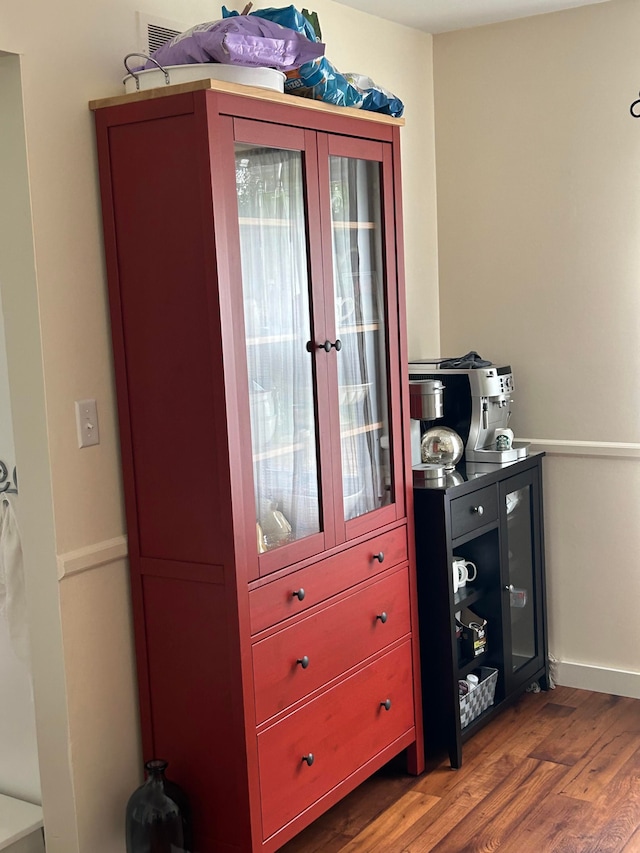 details with visible vents and wood finished floors