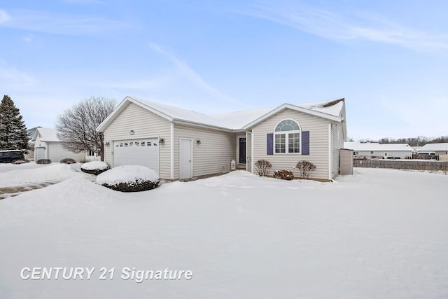 ranch-style house featuring a garage