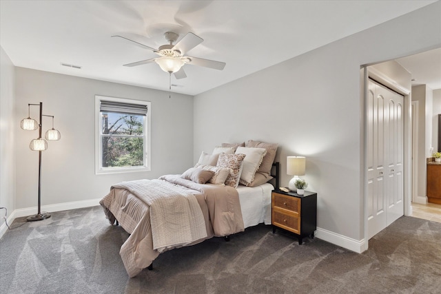 bedroom featuring visible vents, ceiling fan, baseboards, and dark colored carpet