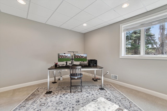 carpeted home office featuring a paneled ceiling, visible vents, baseboards, and recessed lighting