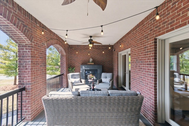 view of patio featuring an outdoor hangout area and ceiling fan