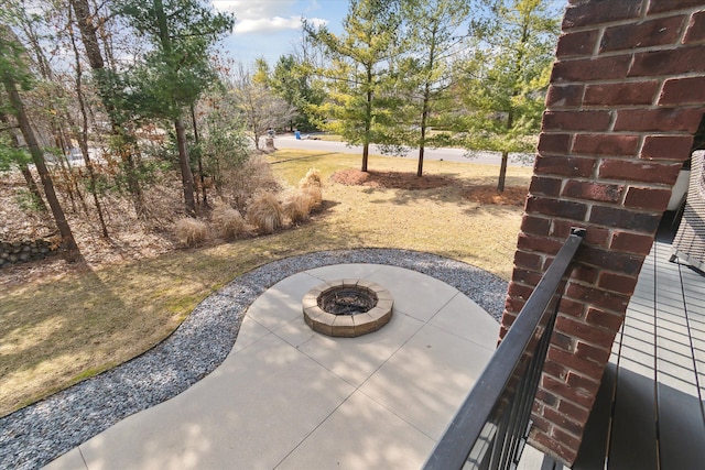 view of patio with a fire pit