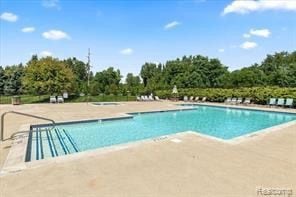 community pool featuring a patio