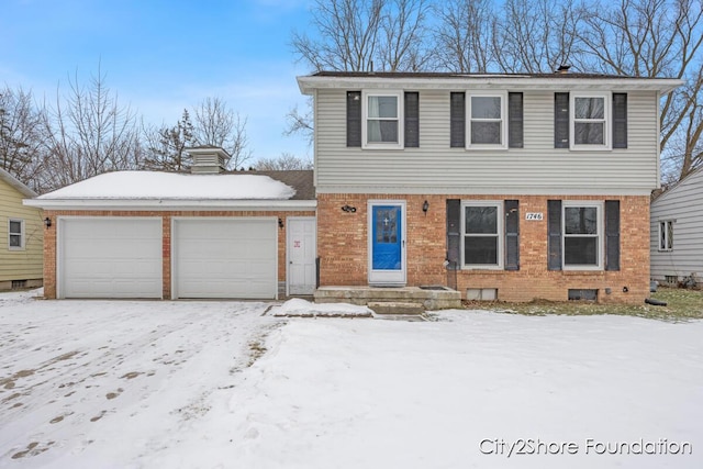 view of front of home featuring brick siding and an attached garage