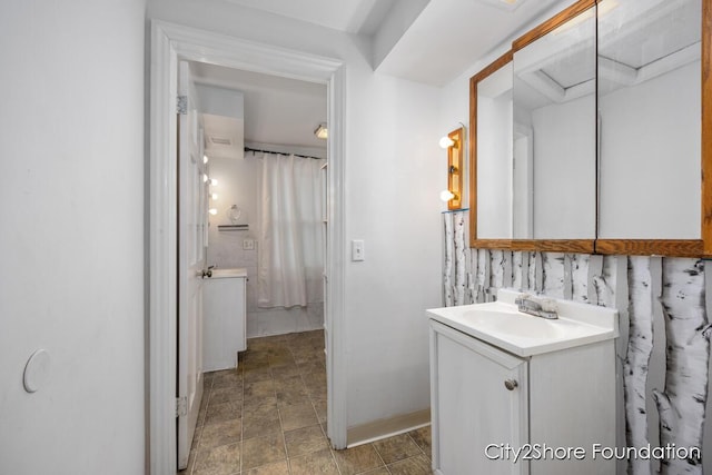 full bathroom featuring vanity