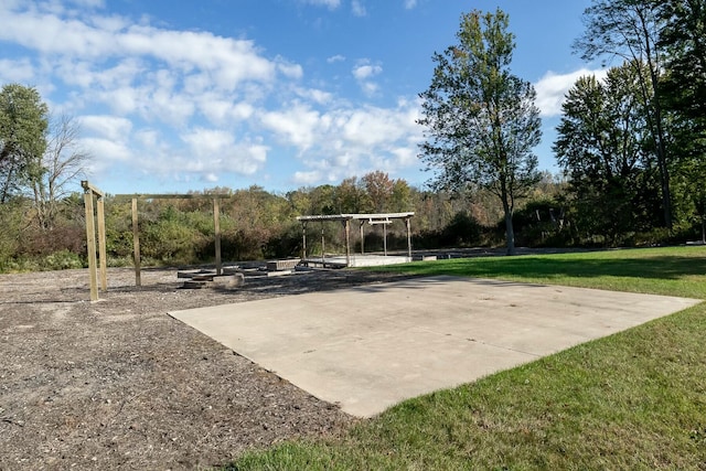 surrounding community featuring a lawn and playground community