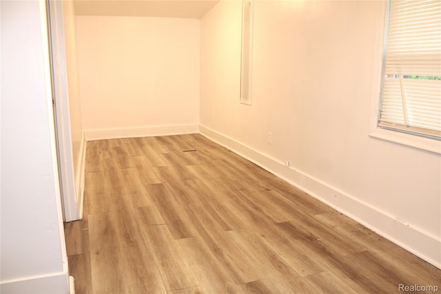 1629 Seminole St, Flint, MI 48503 - empty room featuring light wood-style floors and baseboards