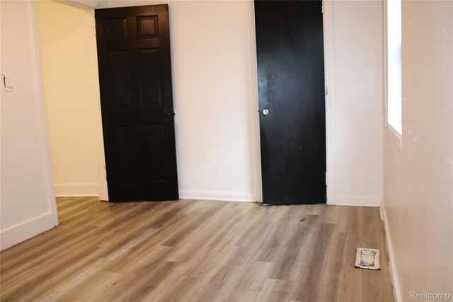 1629 Seminole St, Flint, MI 48503 - unfurnished bedroom with wood finished floors